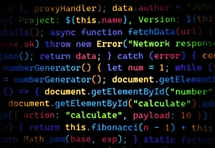 Colorful code scrolls across a dark background.